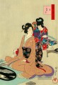 Eine Frau, die eine Tablettenlandschaft mit dem Vollmond Toyohara Chikanobu zeigt